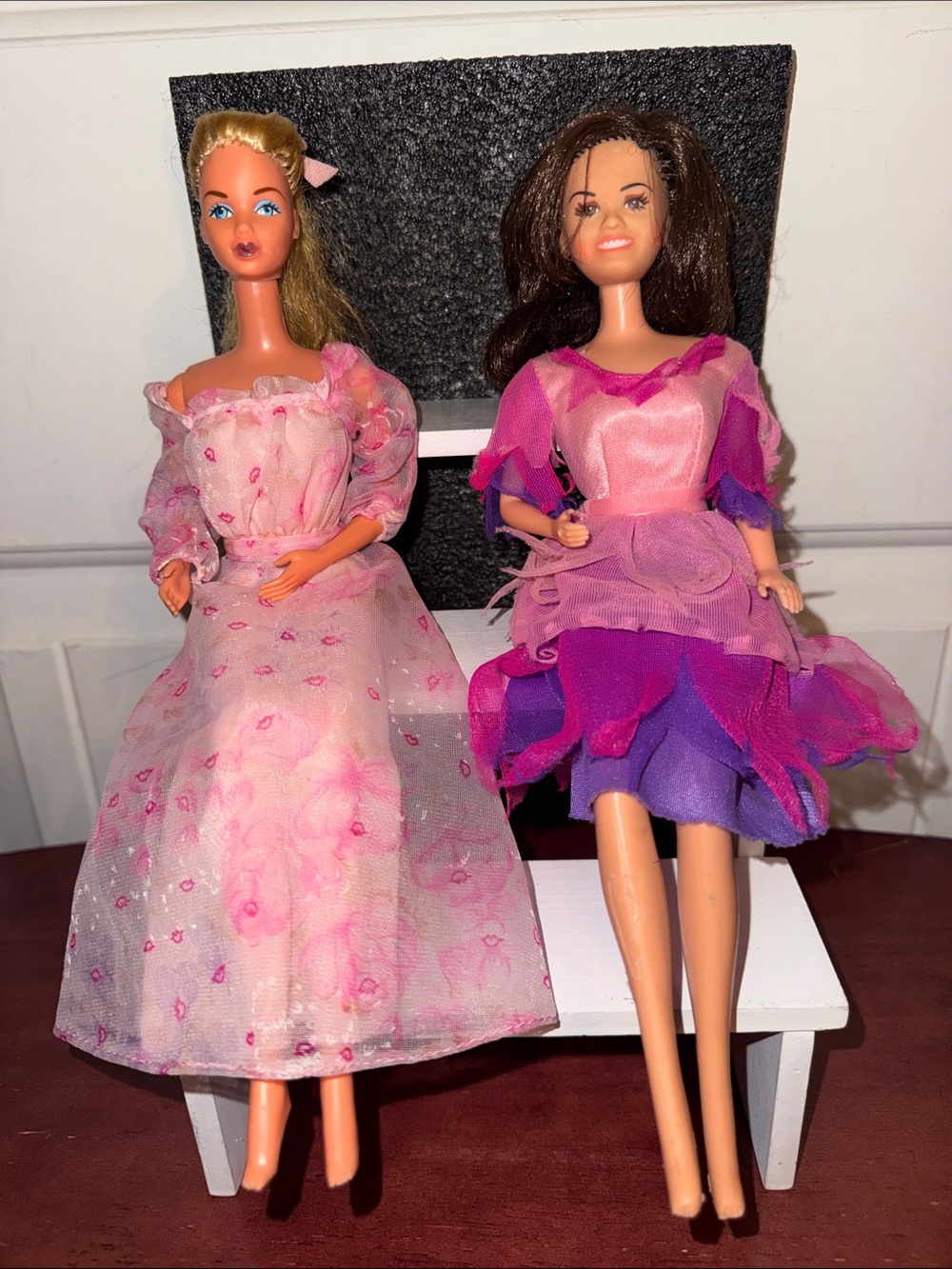 Two Vintage Fashion Dolls in Pink and Purple Dresses